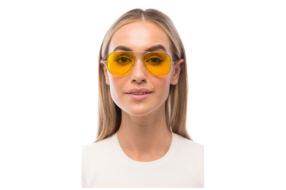 Woman Wearing Maverick Light Sensitivity Glasses Prescription
