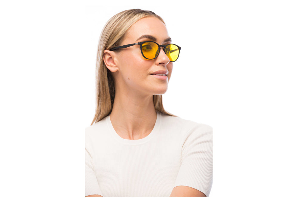 Woman Wearing Echo Light Sensitivity Glasses Prescription