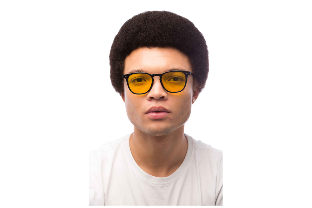 Man Wearing Parker Light Sensitivity Glasses Readers