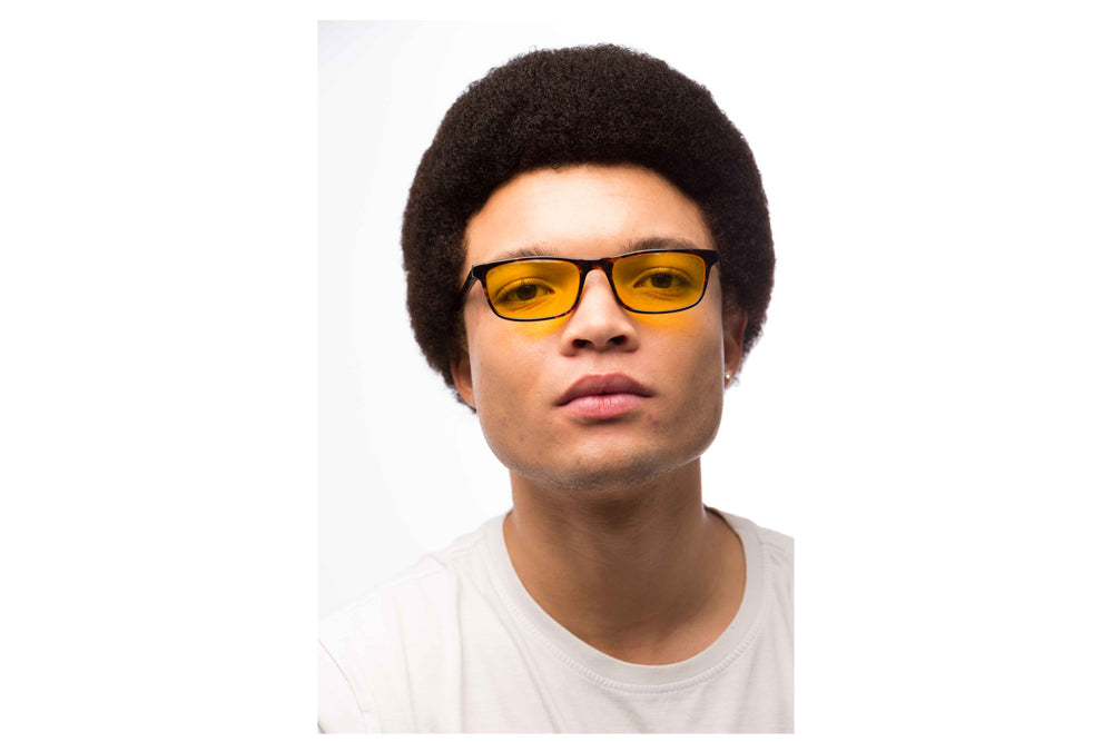 Man Wearing Tortoise Shell Light Sensitivity Glasses Readers