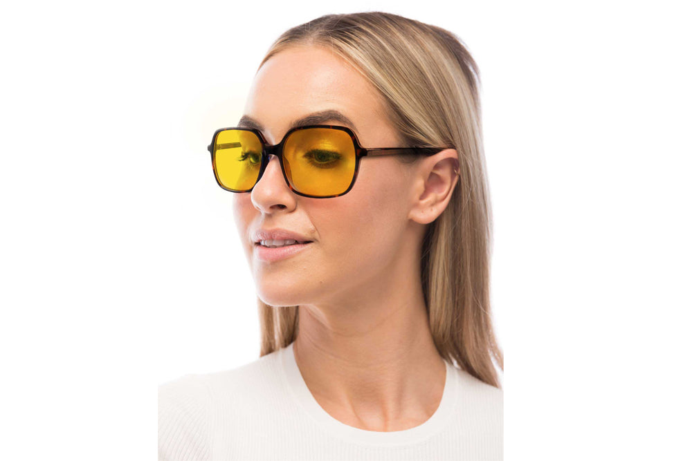Woman Wearing Blaire Light Sensitivity Glasses Prescription