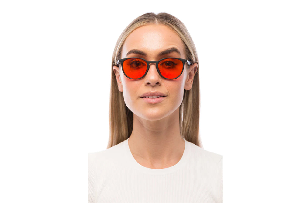 Woman Wearing Echo Blue Light Blocking Glasses Readers