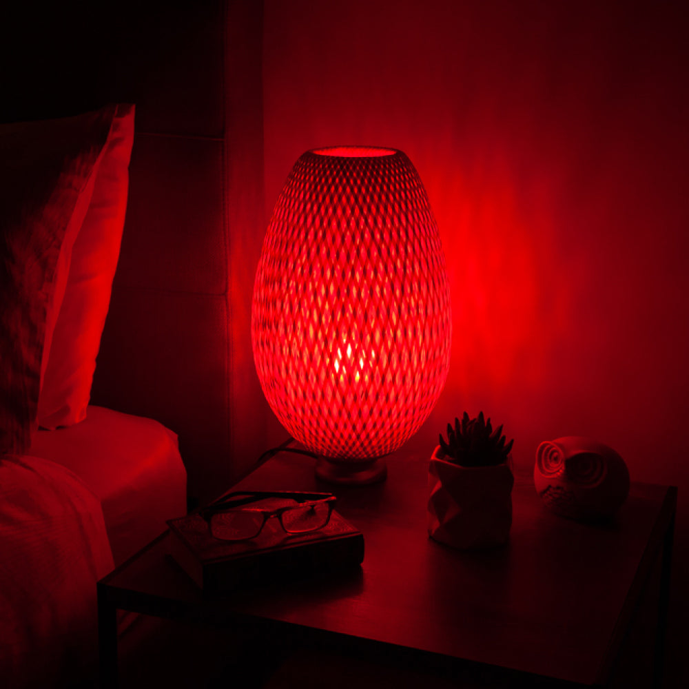 red light glow from Lamp on bedside table