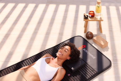 Woman Laying on Infrared PEMF Mat Max